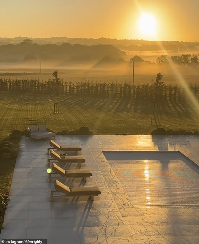 The manicured garden comes complete with a swimming pool and sun loungers for relaxing