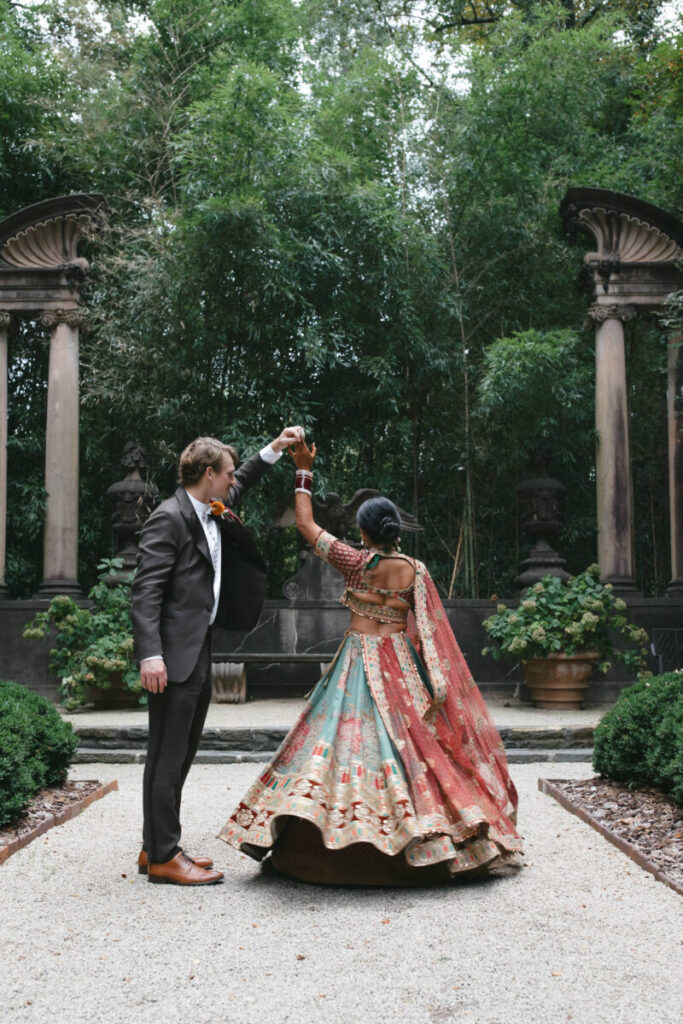 South Meets South Asia at a Showstopping Atlanta Wedding – Garden & Gun A couple in a garden
