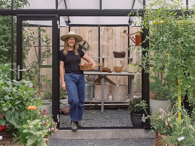 Kenley Larkin designed and maintains cookbook author Alex Snodgrass’ greenhouse, which...