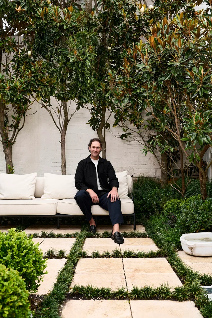 Nate White in a garden