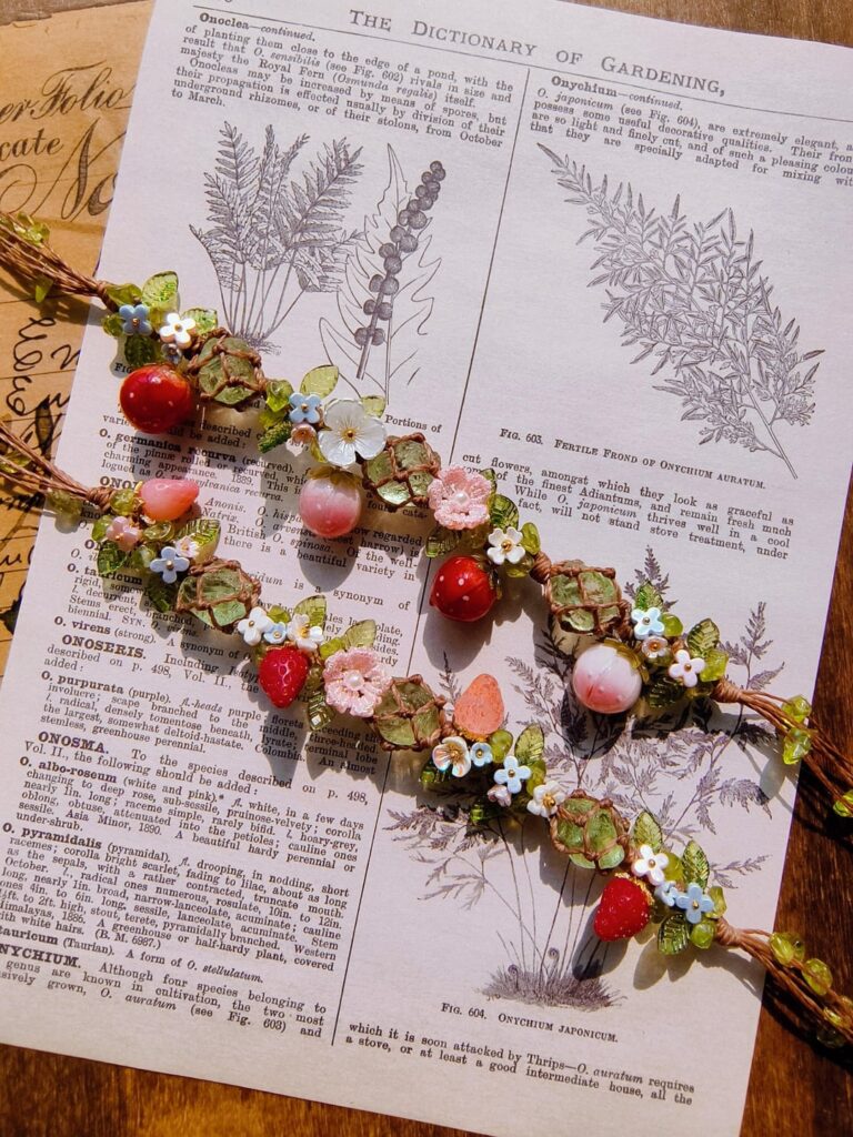 I recently made two strawberry bracelets using crystals, waxed cord, and strawberry charms. How do they look? 🍓💗