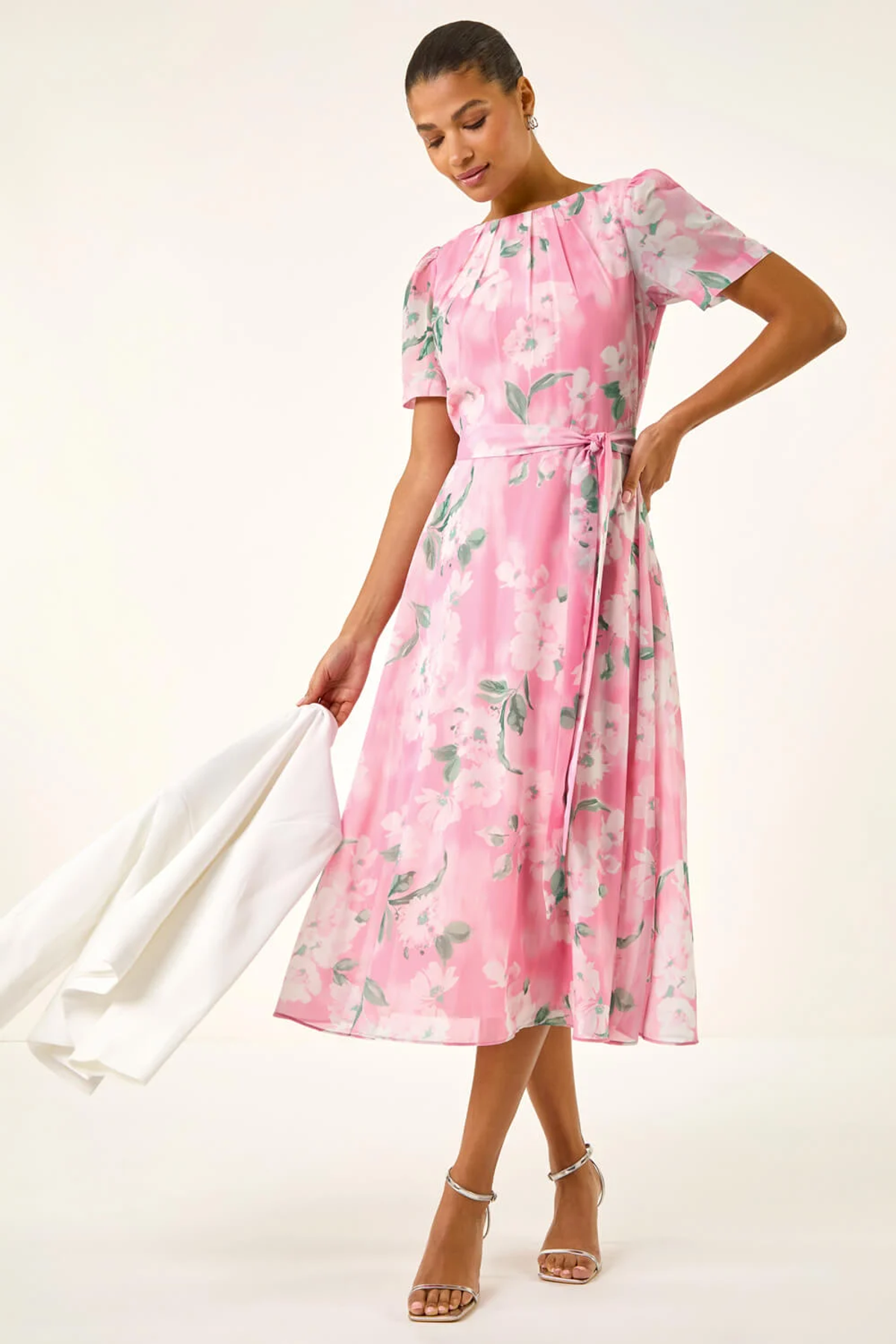 The floral dress comes in five colours including a royal blue and pretty pink hue