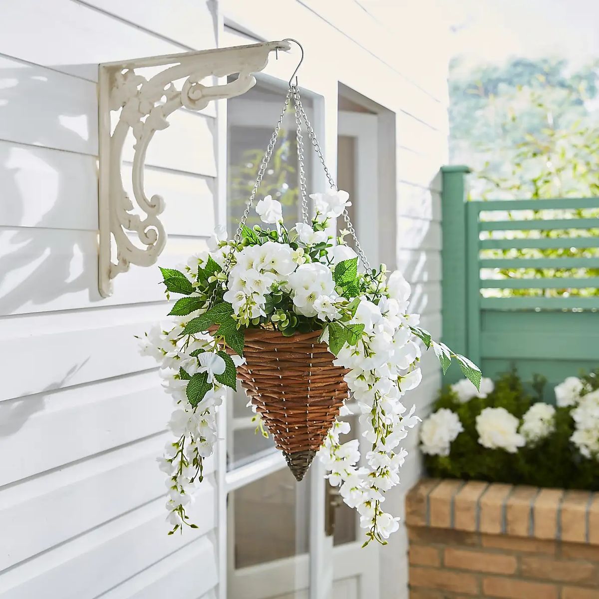Dunelm's £25 Artificial White Floral Brown Rattan Hanging Basket