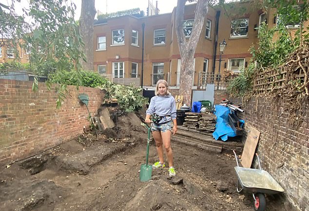 Born in Moscow in 1984 to parents whose families were exiled to Tajikistan during Stalin's Great Purge, Ms Dolman later trained as both a journalist and artist. Pictured: Ms Dolman preparing her garden for the sheds