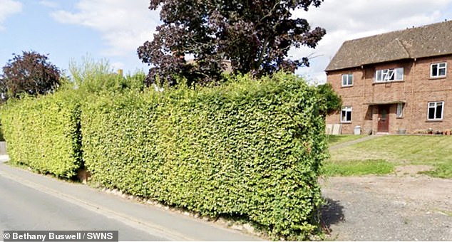 Ian and Bethany Buswell said the parish council had asked them to cut the hedge soon after buying the house because it was spilling over on to the pavement