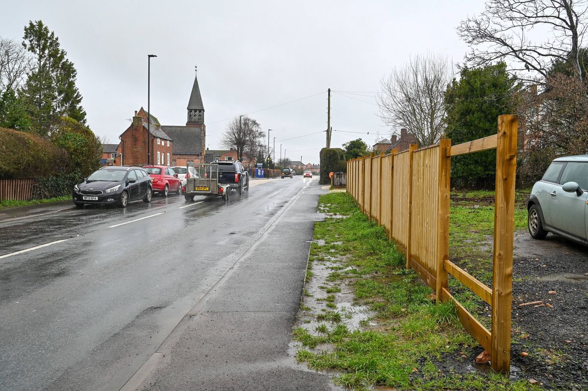 Ian Buswell and his wife Bethany installed the fence around their home to keep their autistic son safe