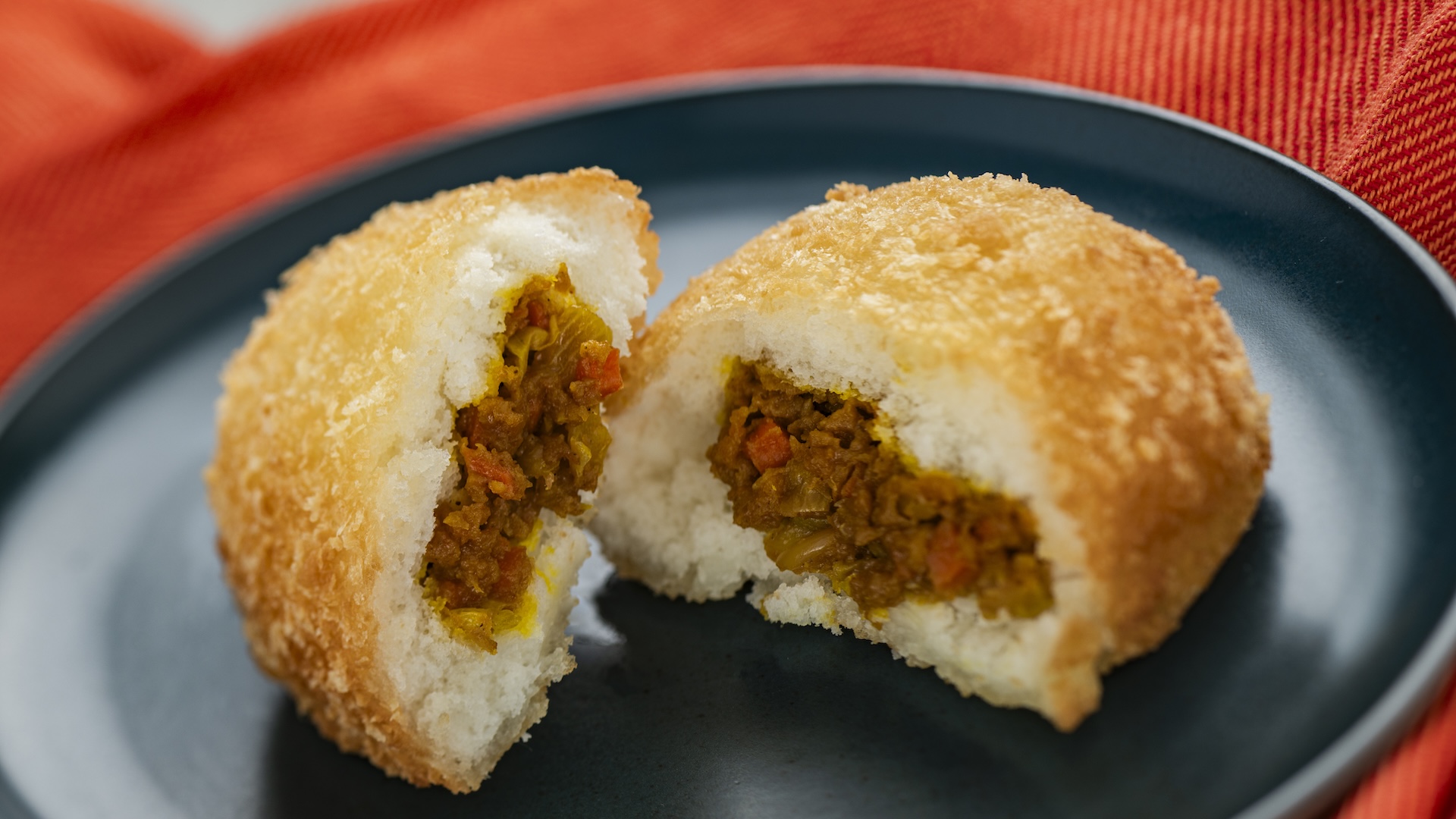 2026-WDW-FG-Foodie-Guide-CurryBread