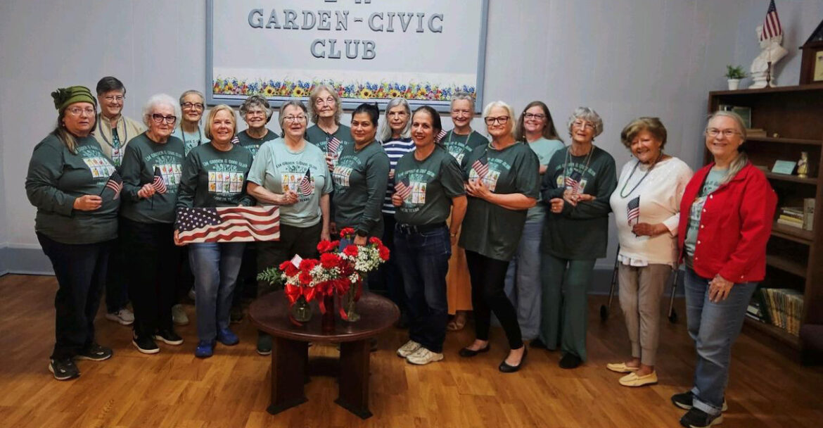 L-M Garden Club members enjoy a Mardi Gras-style meal together