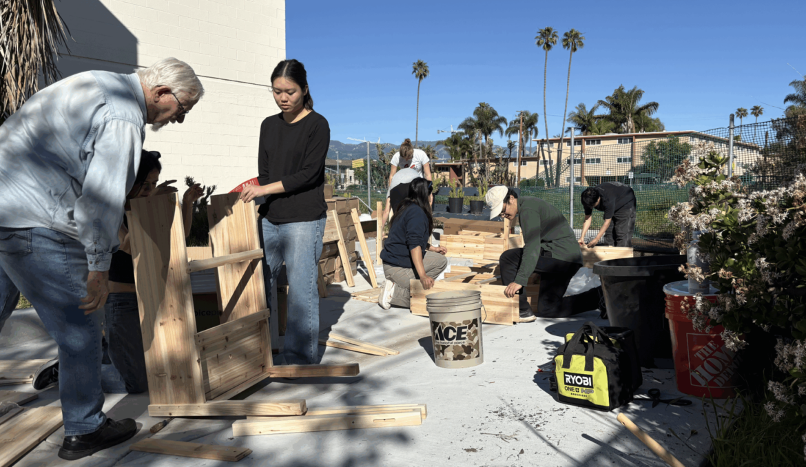 Students build garden beds for local senior home
