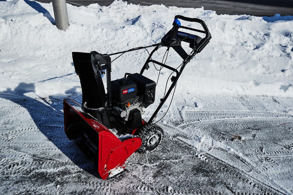 snow blower on a snowy surface.