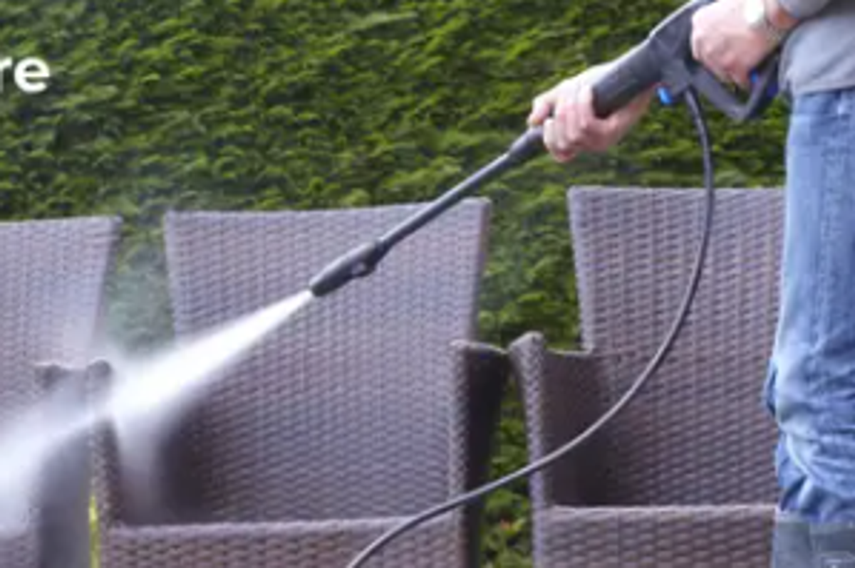 Man using pressure washer