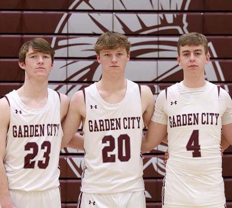 Three basketball players