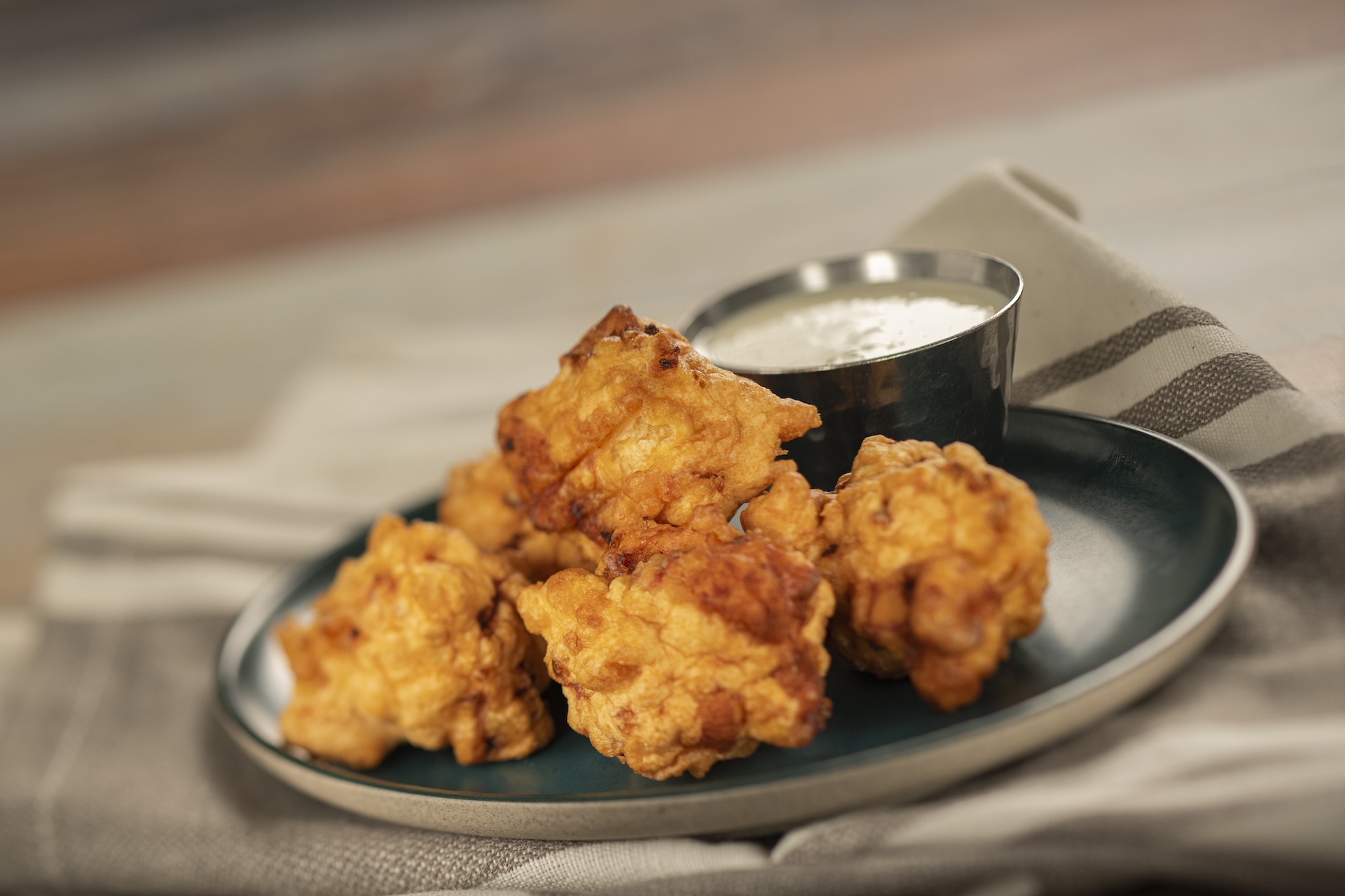 2026-WDW-FG-Foodie-Guide-Conch-Fritters