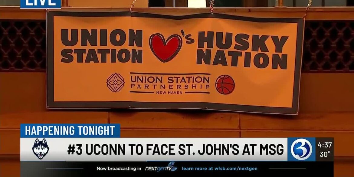 Union Station welcomes Husky Nation with banners as fans travel to Madison Square Garden for rivalry game