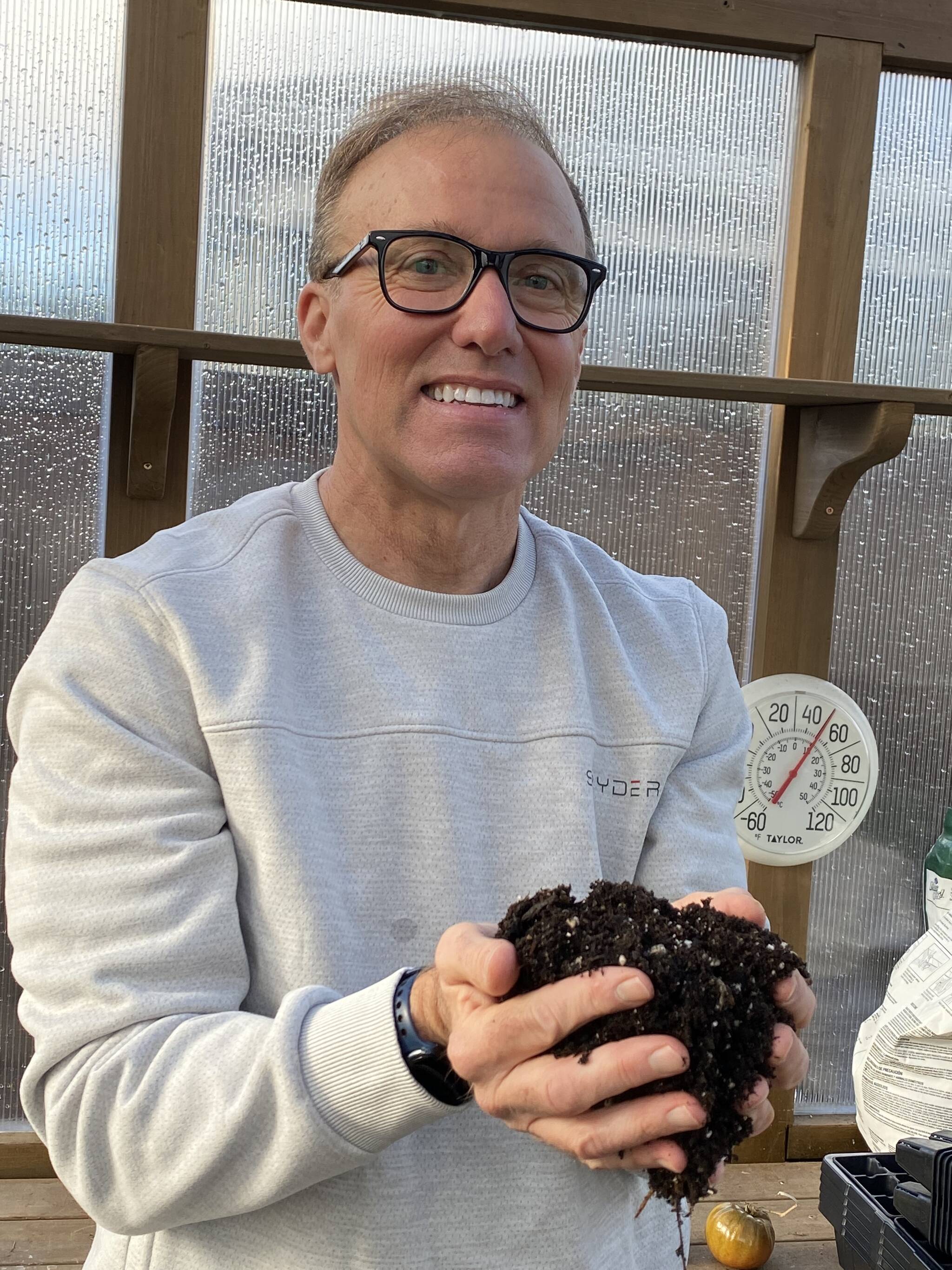 Photo by Corlene Eberly
Love Your Soil, Thursday, Feb. 12t at the Vern Burton Community Center Meeting Rooms, 308 E. 4th Street in Port
Angeles. Photo- Master Gardener Dave Eberly holding soil.