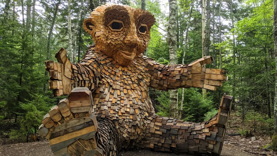 BOOTHBAY, US - Aug 20, 2021: A wooden troll sculpture at Coastal Maine Botanical Gardens in Boothbay
