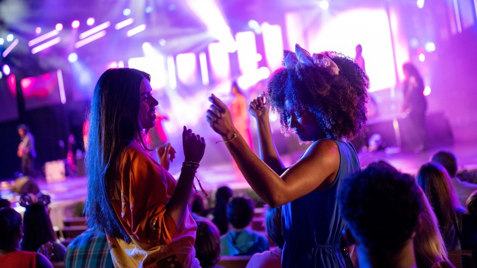 Women dancing at concert