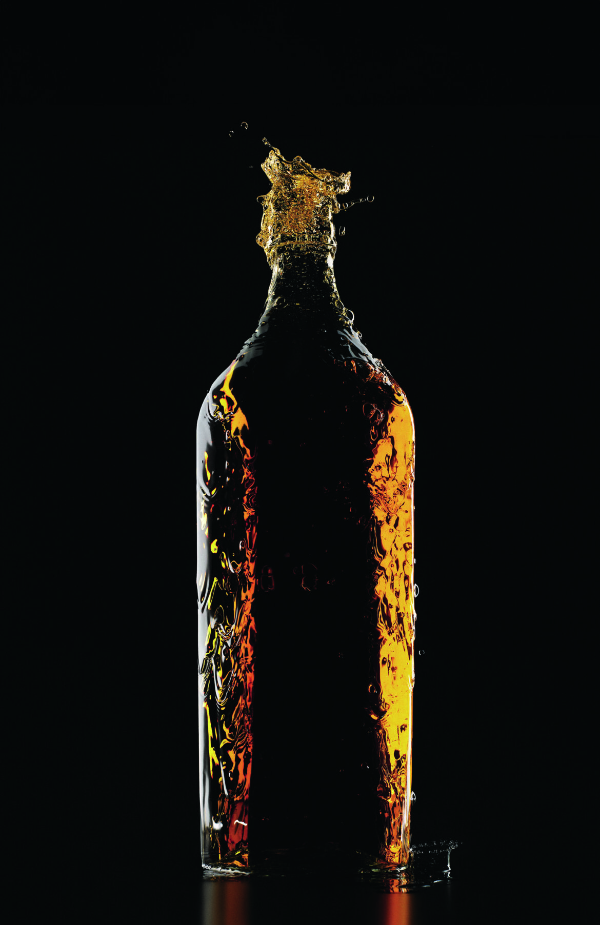 bottle of bourbon against dark back drop