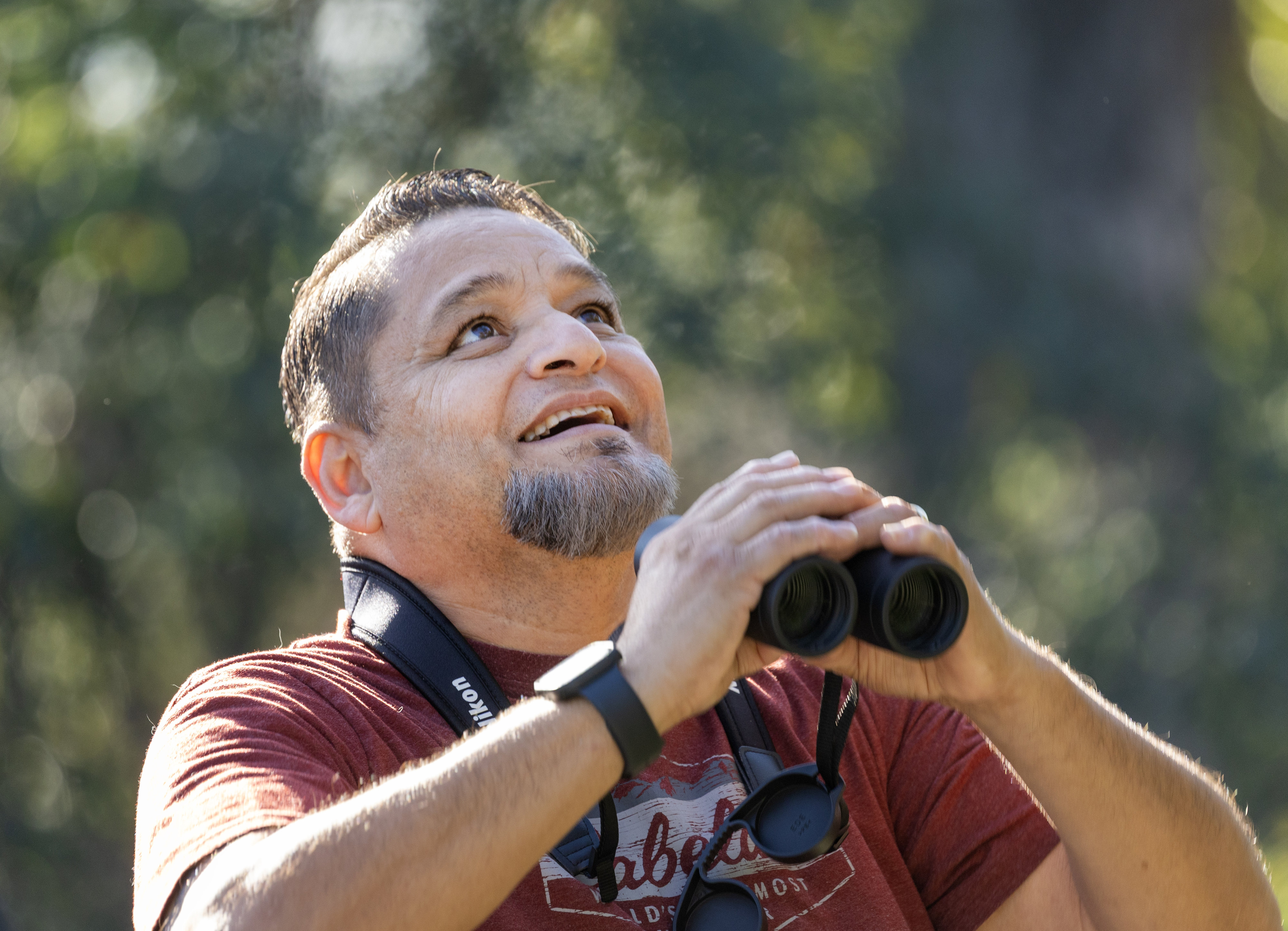 Tony Ruiz of Rancho Cucamonga spots a bird in a...