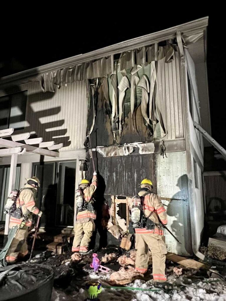 Homeowner Uses Garden Hose to Slow Spread of Fire