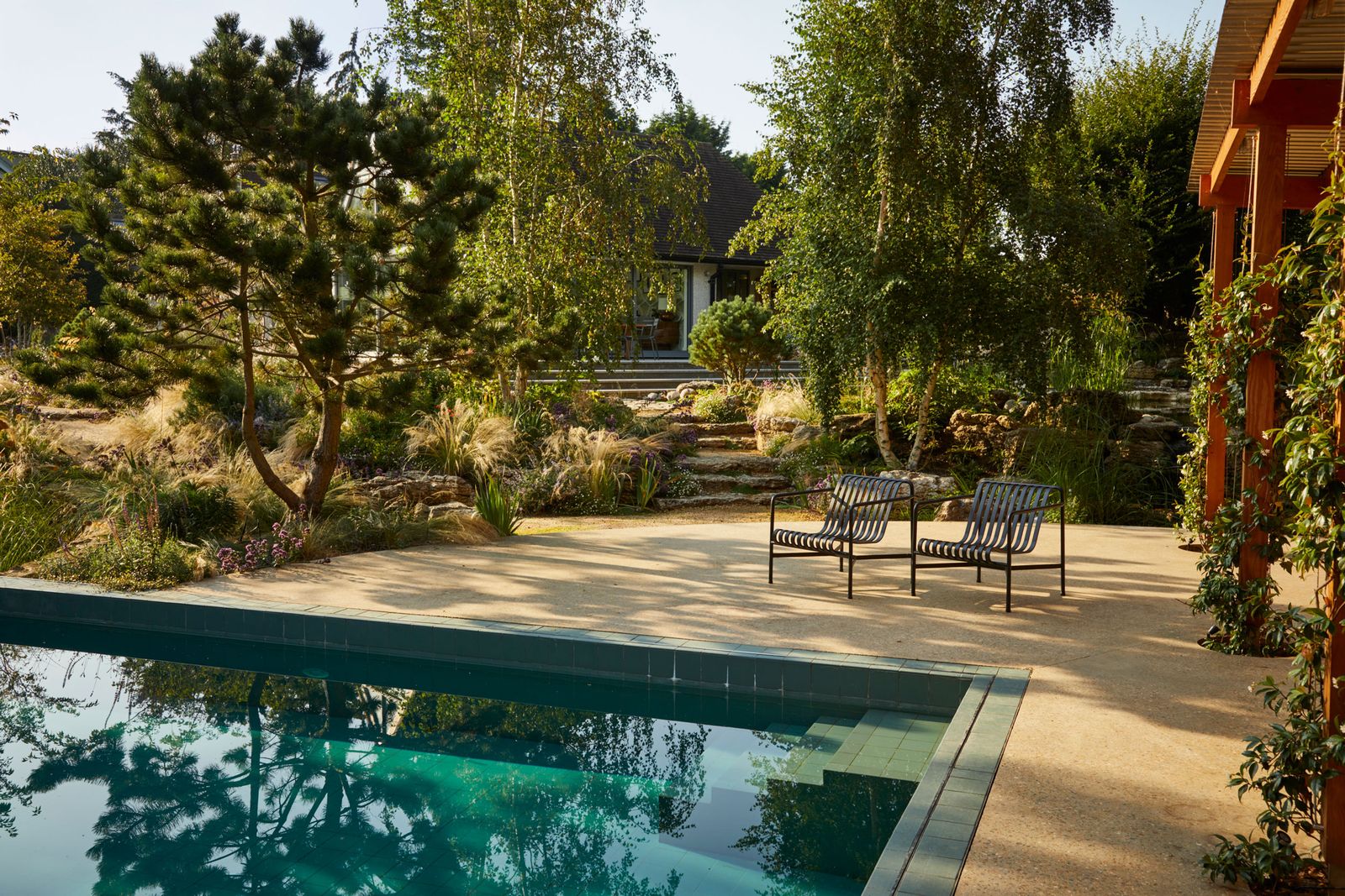 Image may contain Pool Water Backyard Nature Outdoors Yard Swimming Pool Architecture Building Hotel and Resort