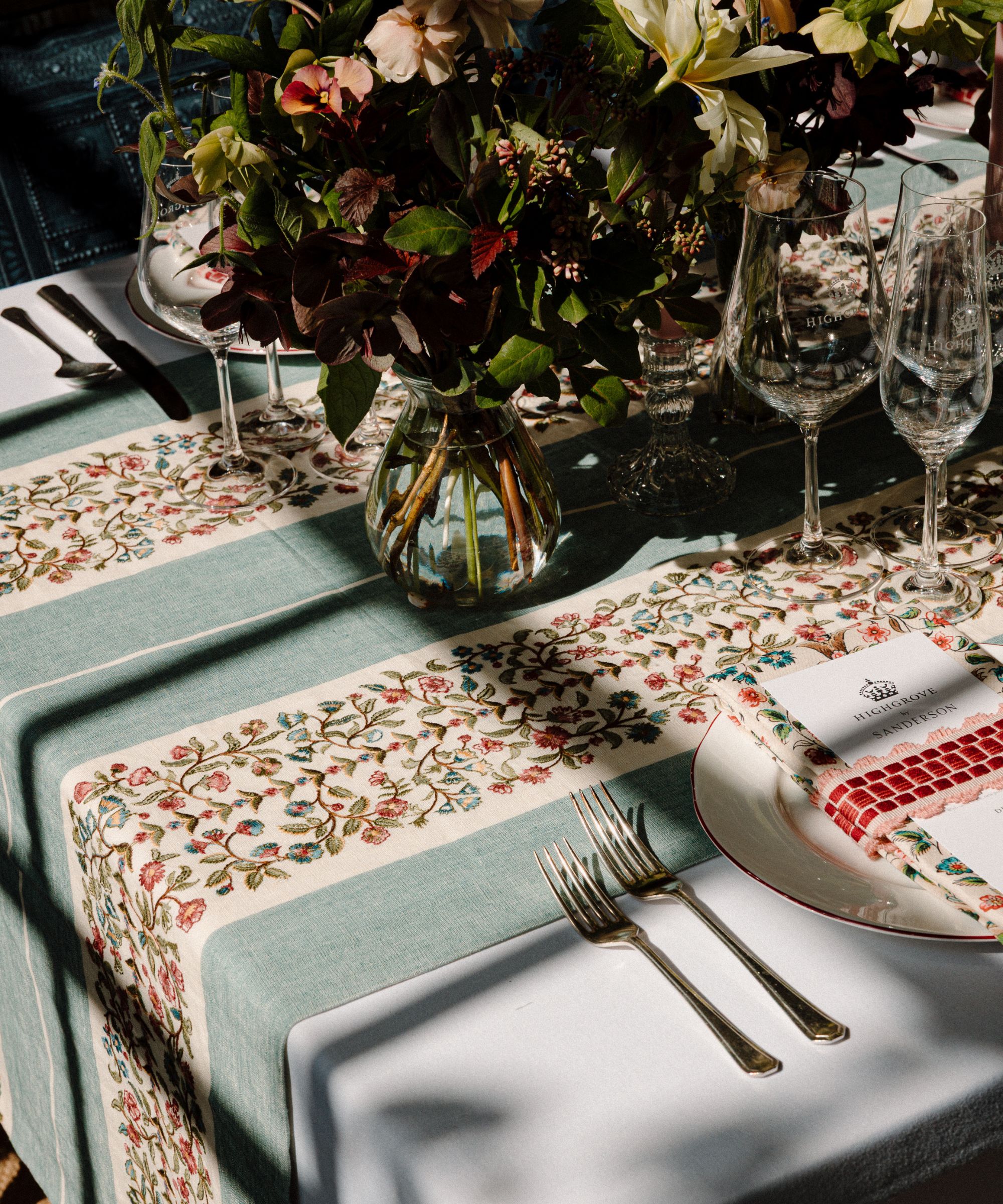 Tablecloth with blue stripes and floral patterns