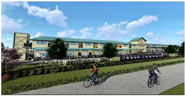 Bikers ride along the West Orange Trail on the northern side of Winter Garden's old citrus packing plant in this rendering of what it will look like after renovations are completed by developer Gay Hasson. The properties that make up the development are located at 1061, 1063 and 1065 Tildenville School Road. (Courtesy of City of Winter Garden)