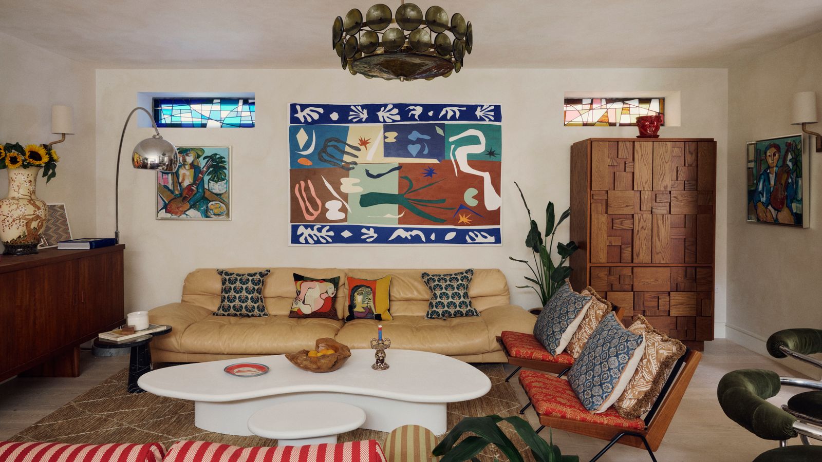 The back wall of Orlagh McCloskeys living room is inset with stained glass windows based on a number of references and...