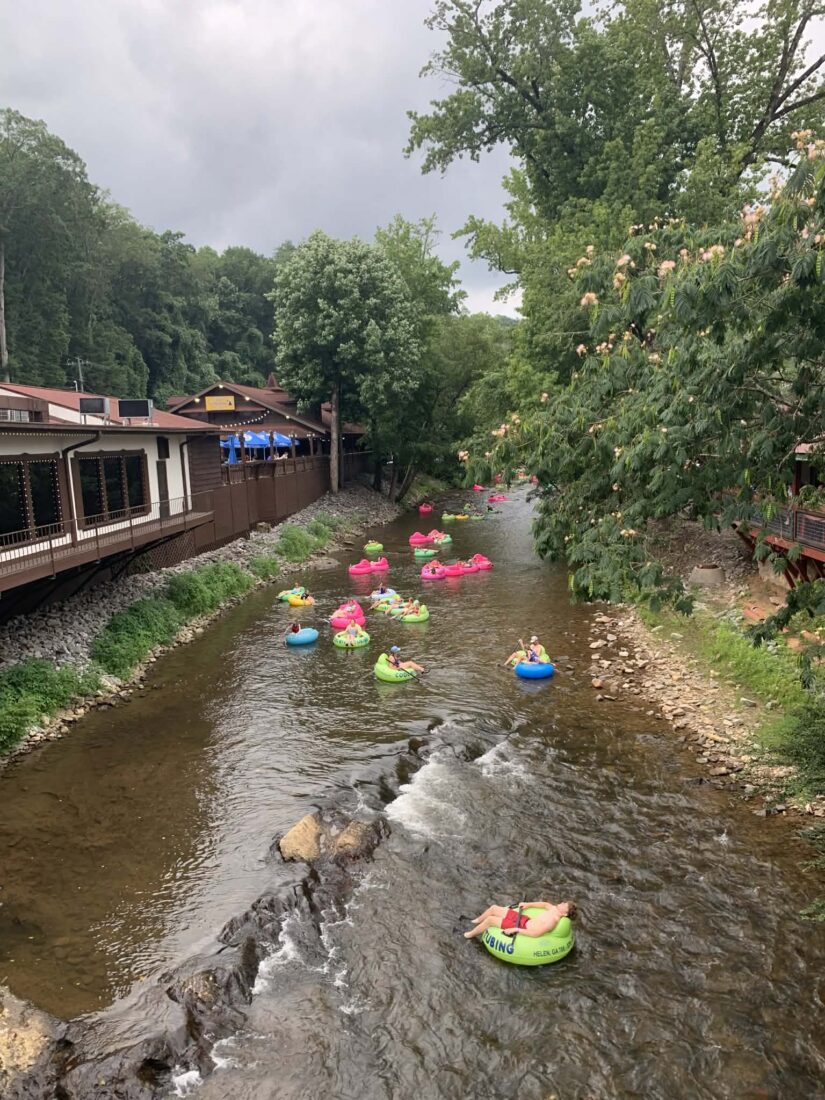 People float on a river