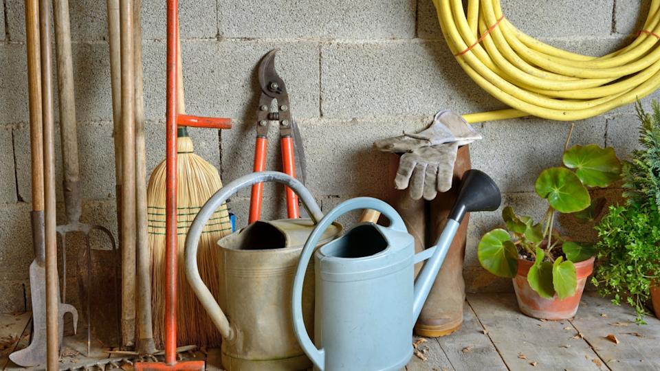 a garden shed with all the tools of the gardener