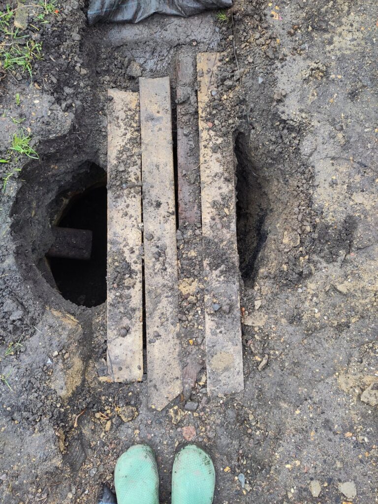 Why is there a 6′ deep brick lined hole in my garden? Why is there a 6' deep brick lined hole in my garden?