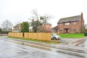 Image shows the Buswells' brand-new fence they have been told to take down at their home in Hallow in Worcester.