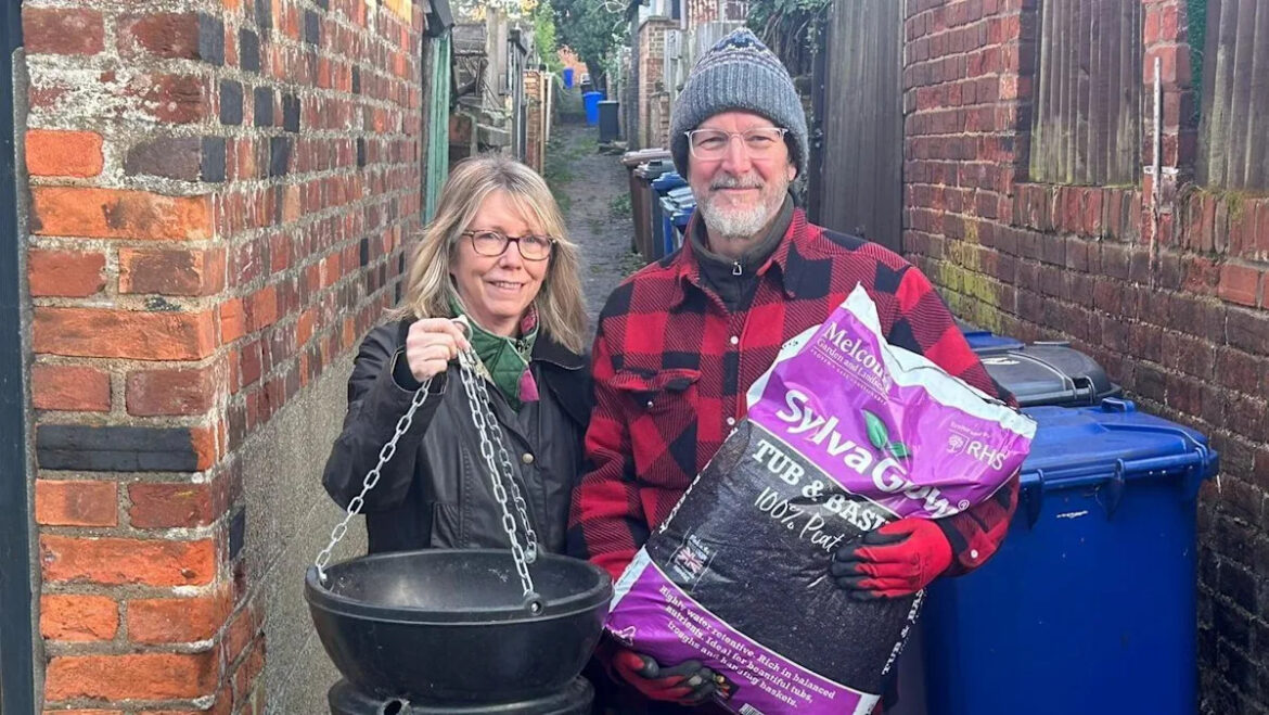 Locals transform 'bin alley' into community garden