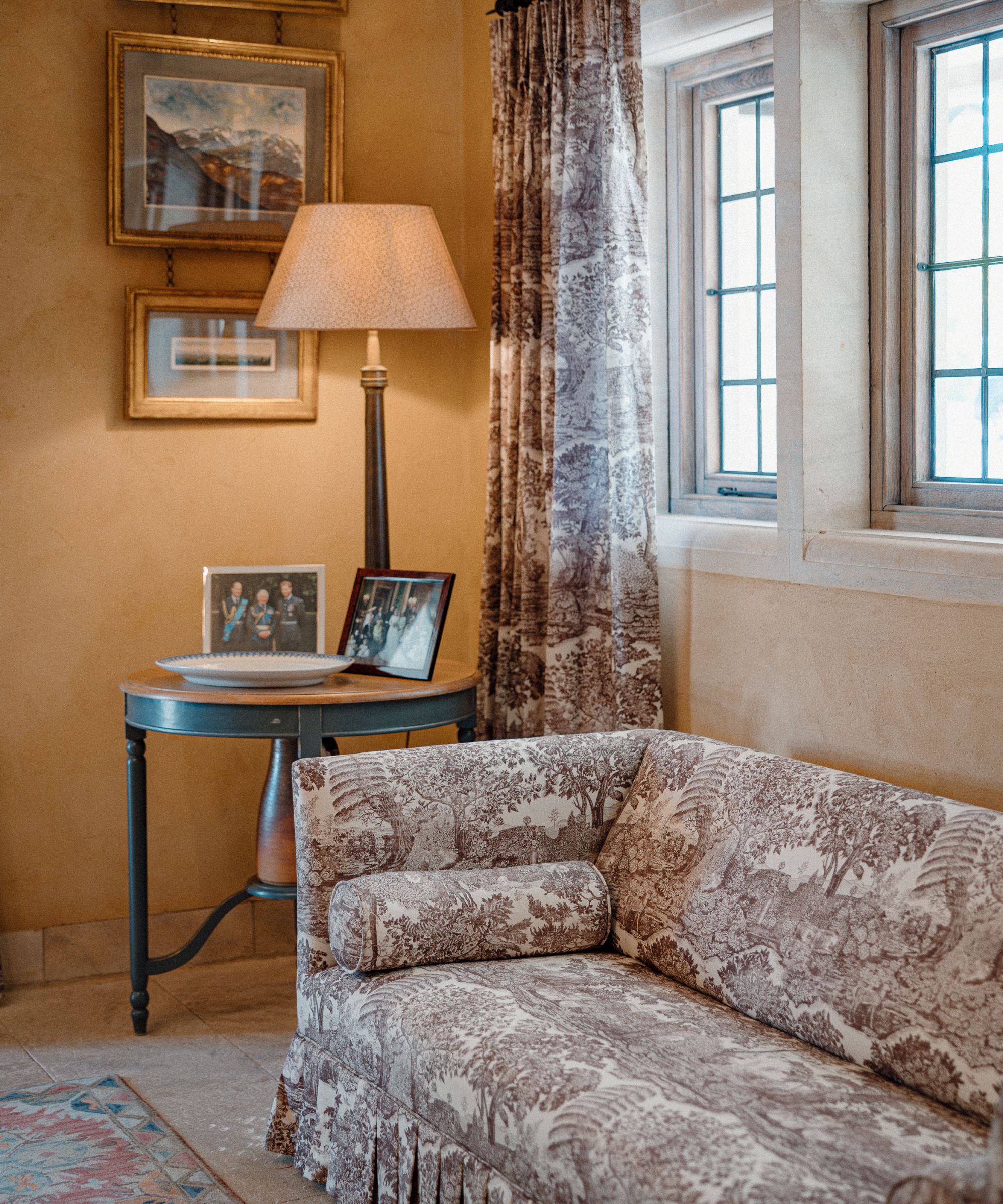 Sofa and curtains in brown toile fabric