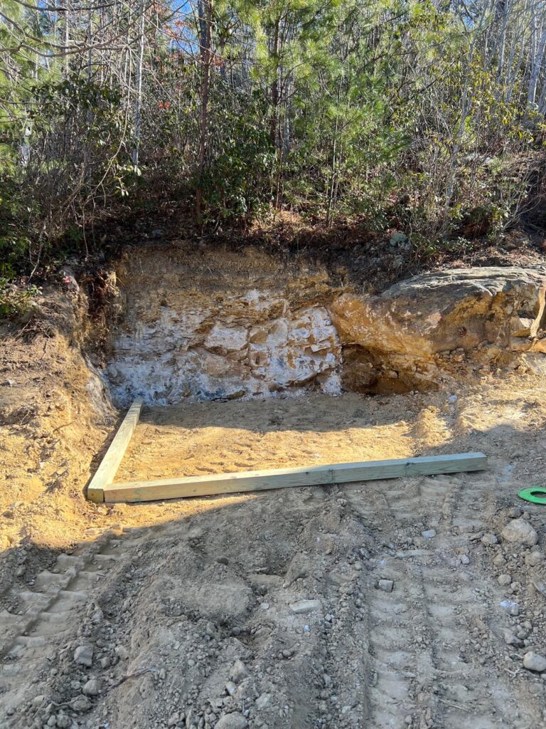 Building a sauna pad into side of mountain. Help/tips?