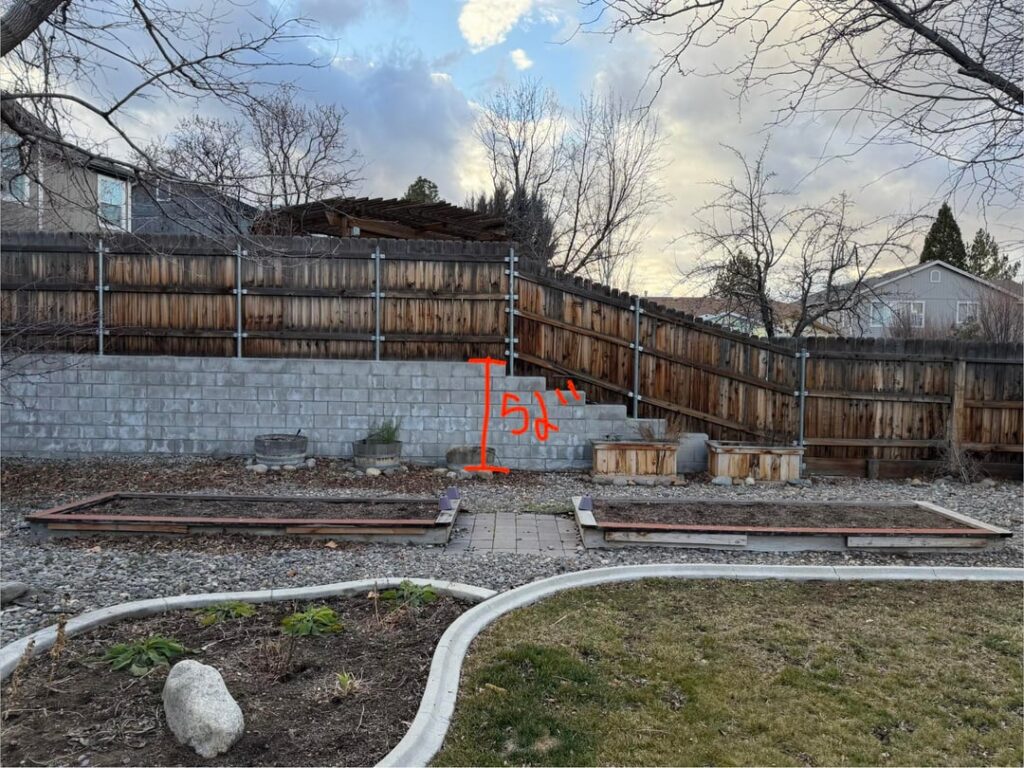 Can we safely put raised beds 3 feet away from this retaining wall?