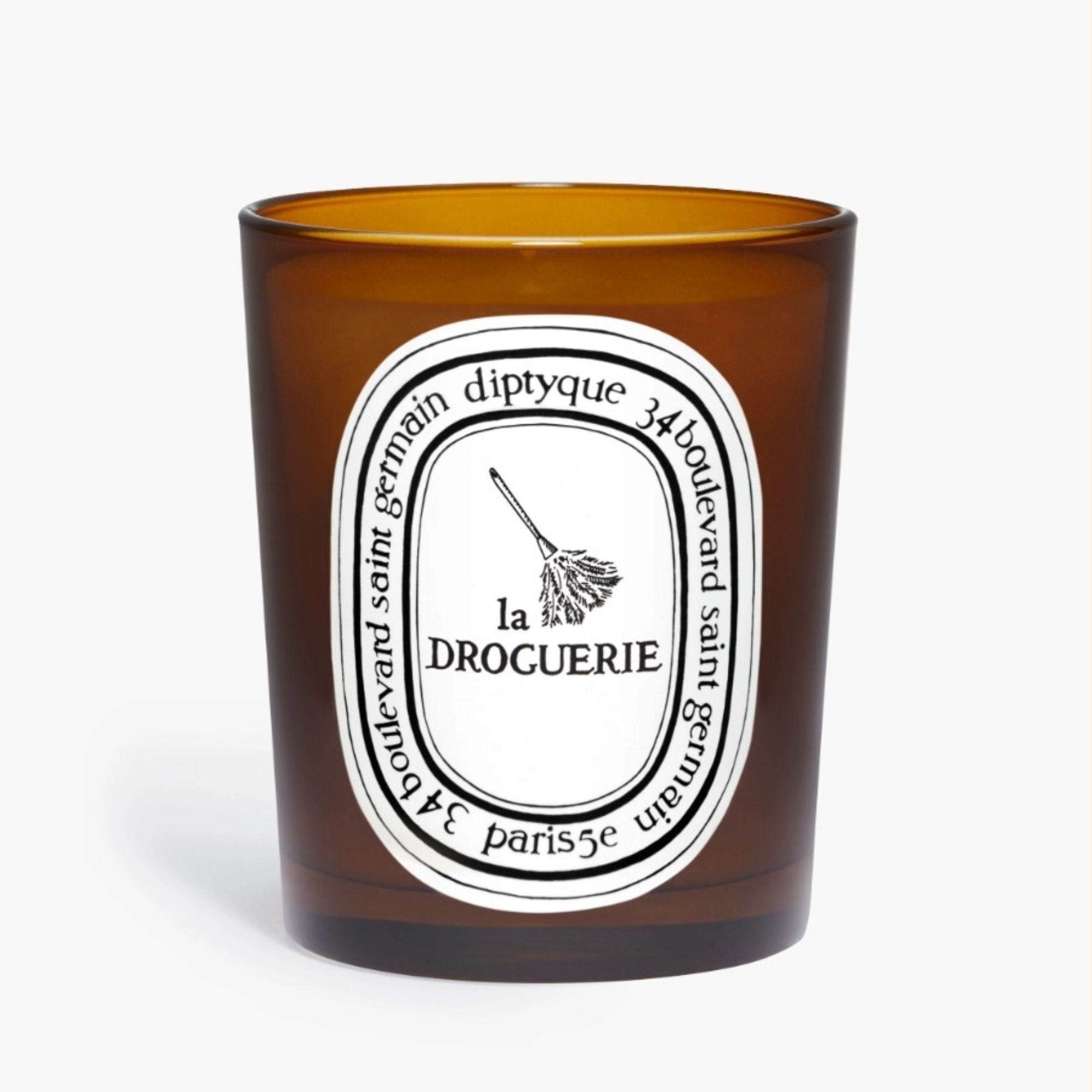 Brown glass Diptyque candle