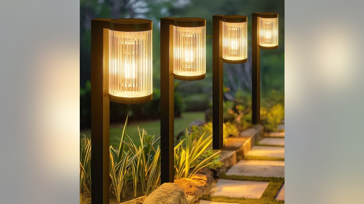 Line your walkway with these solar lights to create a dramatic effect.