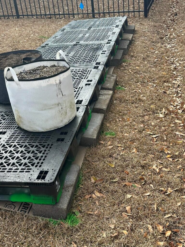 Best way to support plastic pallets for grow bags? Current setup feels sketchy.