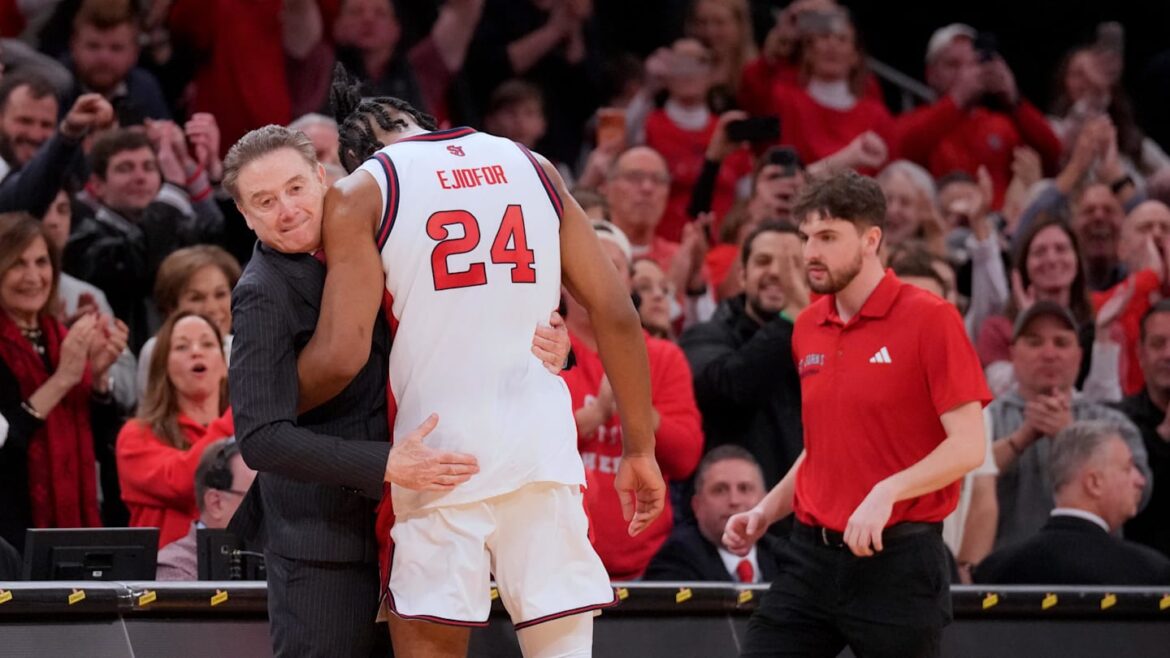 St. John’s to honor Zuby Ejiofor in ‘ring of honor’ next year at Madison Square Garden Mar 14, 2026; New York, NY, USA; St. John's basketball head coach Rick Pitino hugs forward Zuby Ejiofor (24) on the bench in the closing moments of second half of the men's Big East Conference Tournament Championship against the Connecticut Huskies at Madison Square Garden.