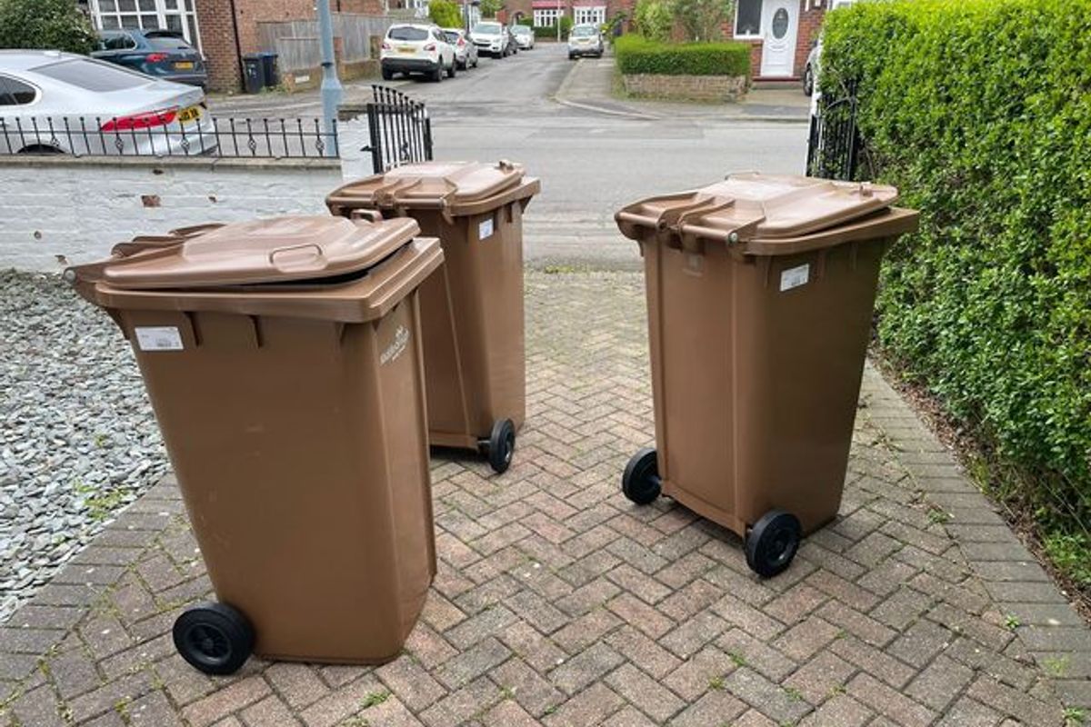 Brown bins in use for the now subscription-based garden waste collection system