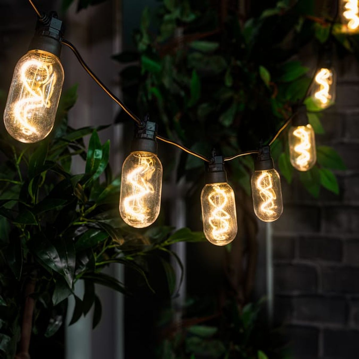The filament-style bulbs come in packs of 10 that are ready to string up in gardens