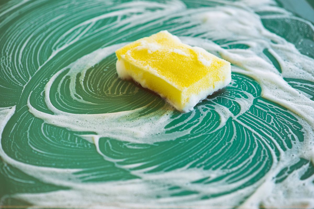 Cleaning with yellow sponge