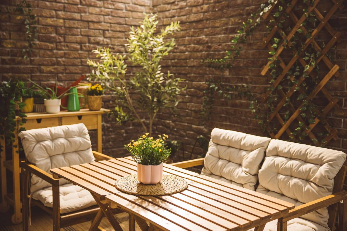 Cozy outdoor patio with wooden furniture