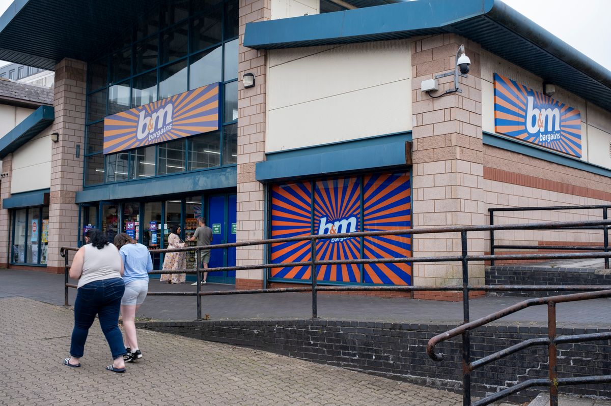 People outside B&M in Aberafan Shopping Centre in Port Talbot town 