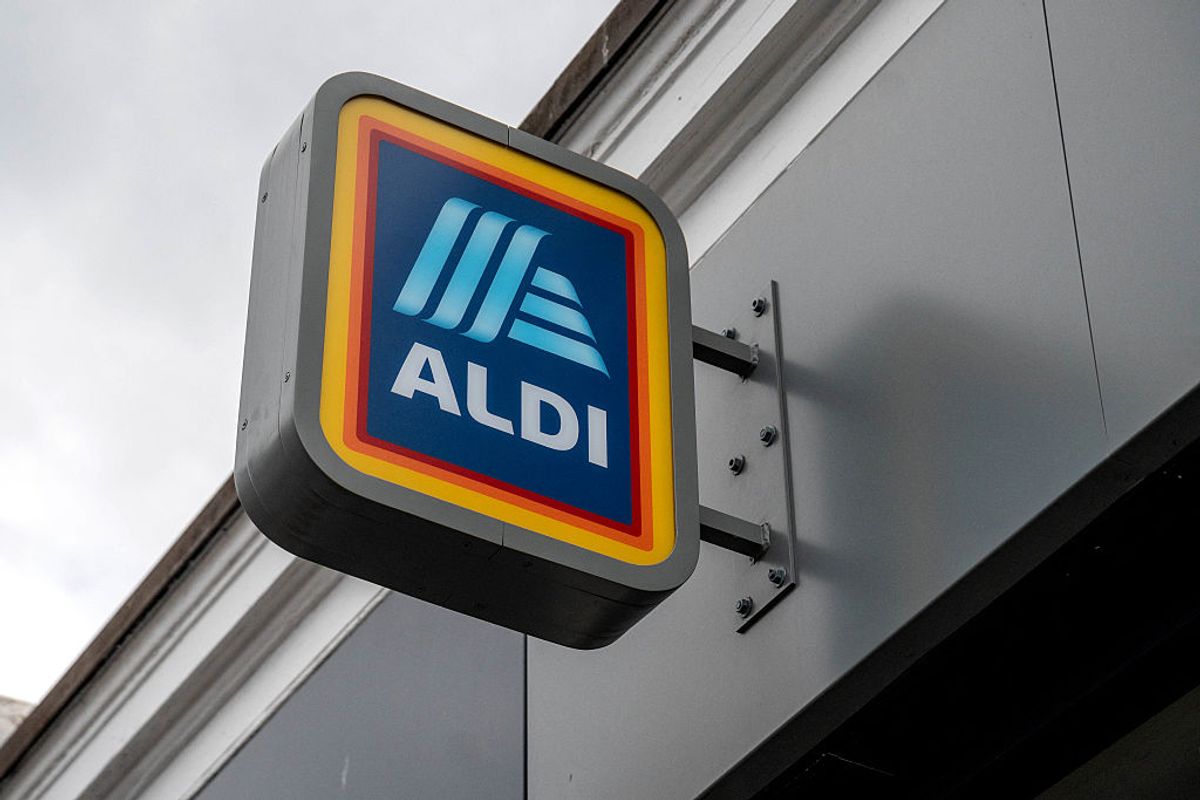A sign hangs outside a ALDI branch in Balham