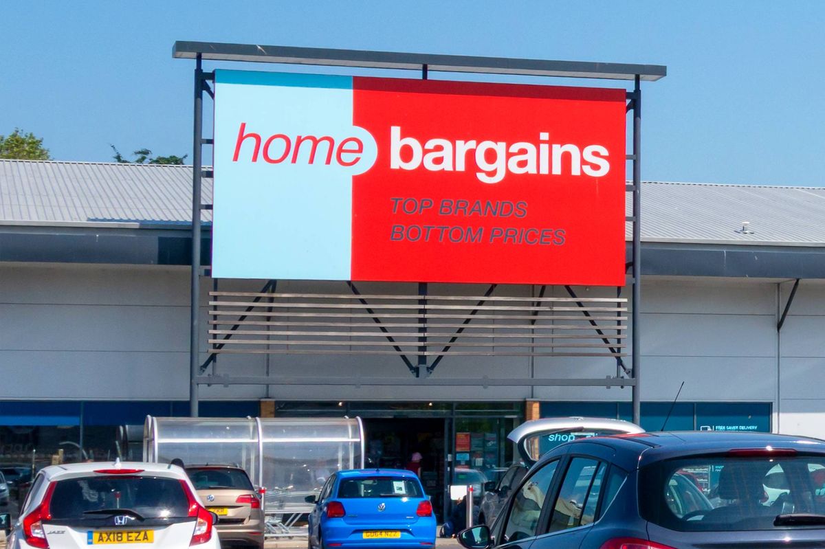 Branches of the Home Bargains and The Food Warehouse chains of stores in Suffolk Retail Park on the outskirts of Ipswich in Suffolk, Eastern England. Home Bargains sells a range of products for the home and garden as well as toys and clothing while The Food Warehouse sells foodstuffs.