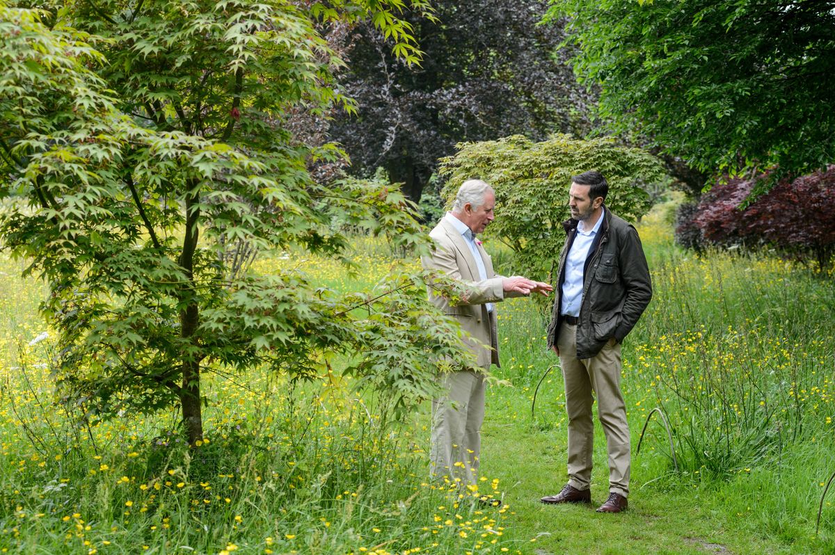 adam frost with prince charles in garden