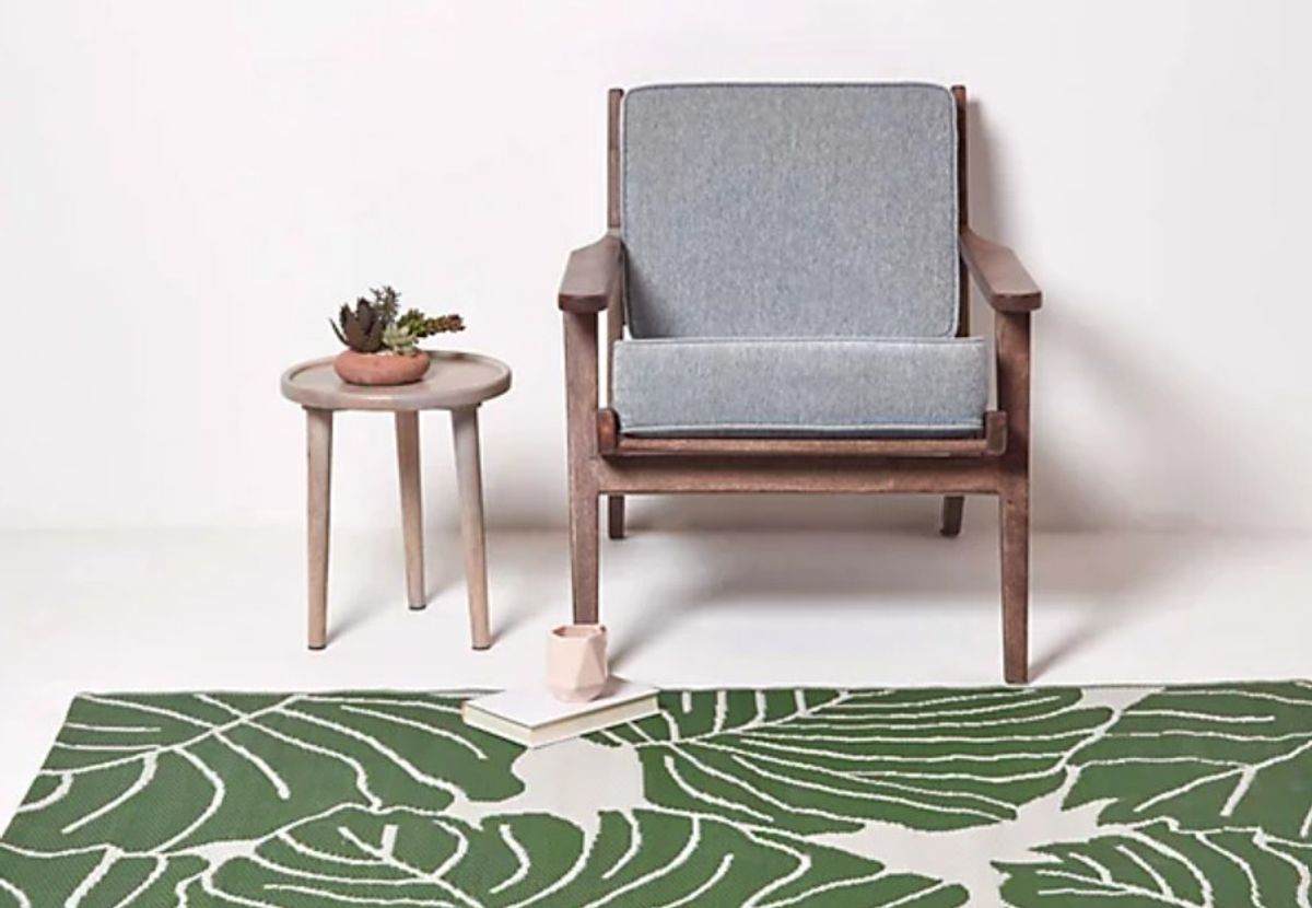 Measuring at 150cm x 240cm, the Ada Botanical rug is large enough to sit under a full patio seating set