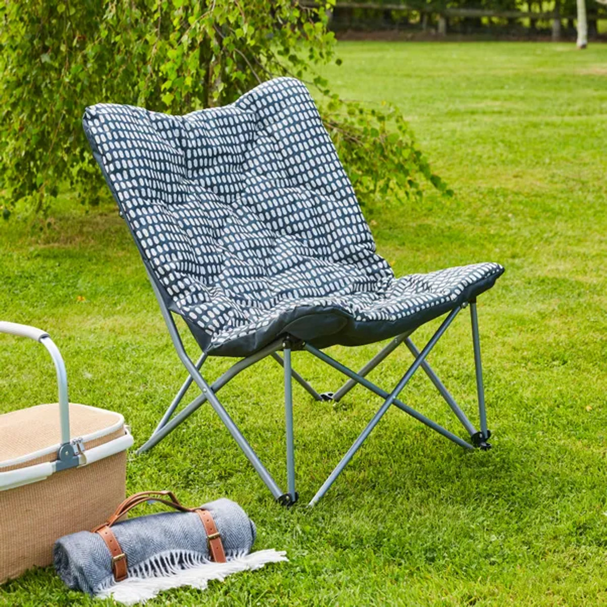 The padded camping chair also comes in navy blue